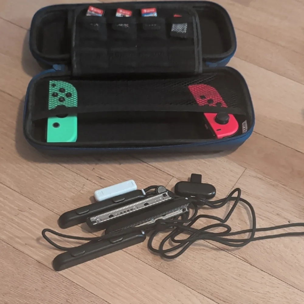 Nintendo Switch with Added Joy cons, Games, Case And Accessories